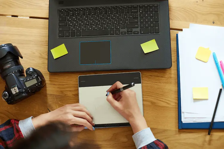 A content plan and post drafts laid out on a desk