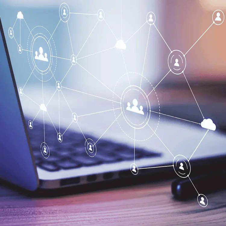 Laptop with a connected network of people and notification icons, symbolizing linked requests flowing between systems