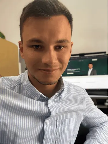 Portrait of Illia Belichenko, technical specialist at Illia BizTech