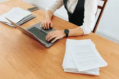 Laptop screen showing a legal document on an office desk
