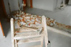 Renovation work in progress in a room with daylight